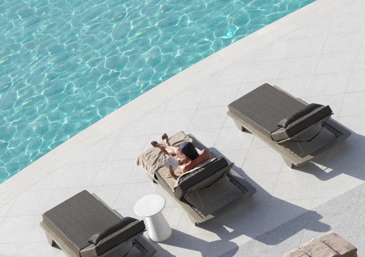 Nautilux Rethymno By Mage Hotels 외부 사진 A man sunbathing